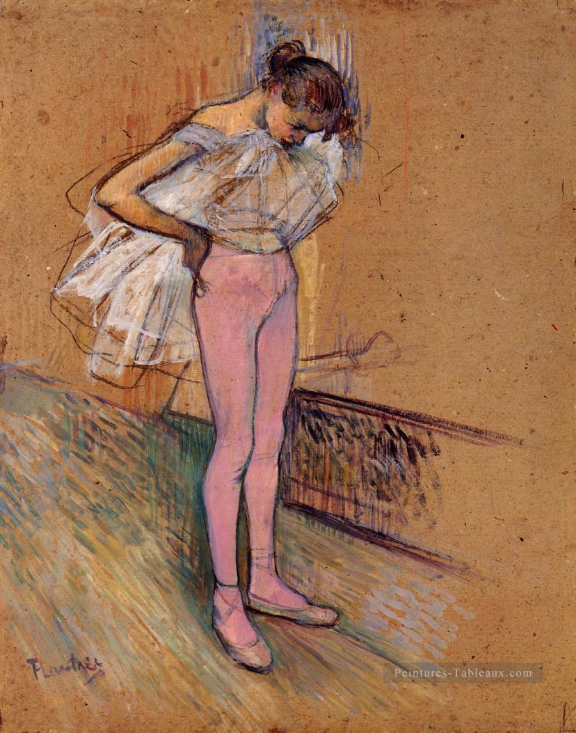 Danseuse ajustant ses collants post Impressionniste Henri de Toulouse Lautrec Peintures à l'huile